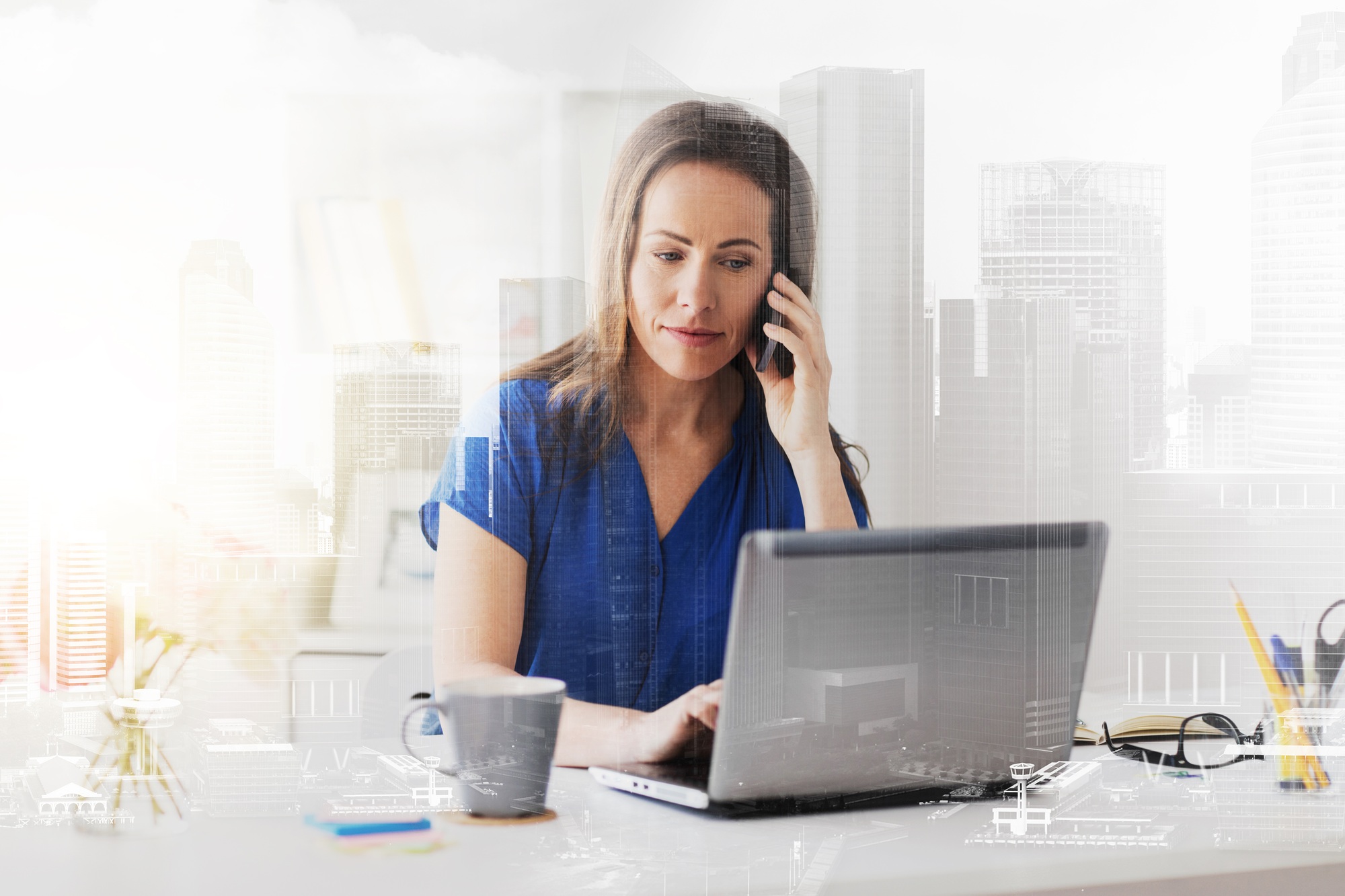 woman calling on smartphone at office